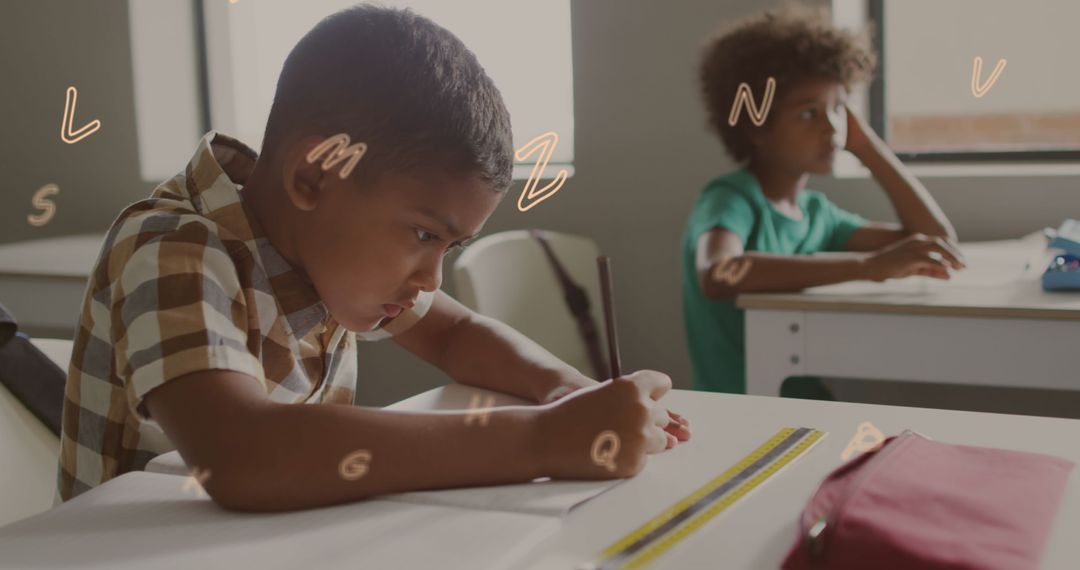 Diligent Schoolboy Focused on Classroom Assignment