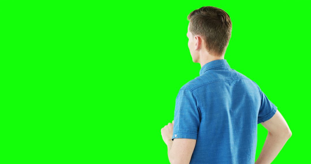 Man Interacting with Digital Display in Technology Setting