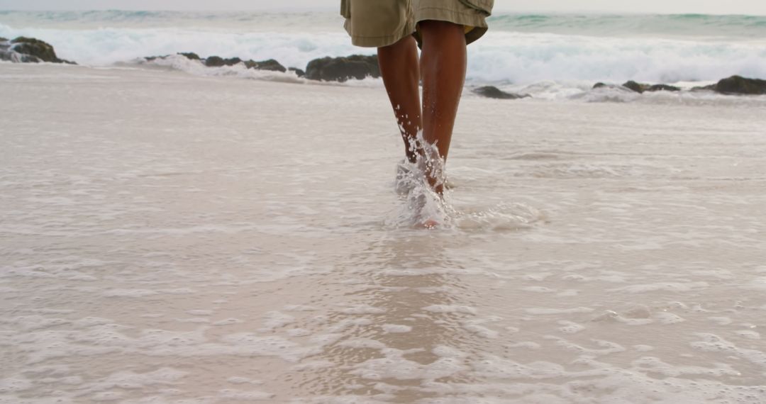 Barefoot Walk on Serene Beach with Gentle Waves