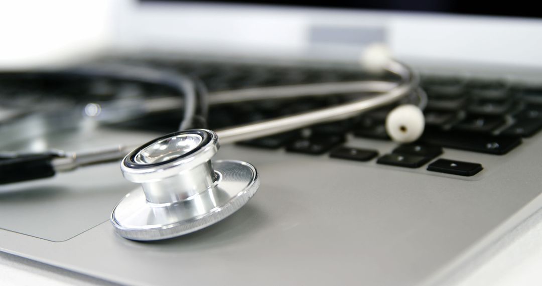 Stethoscope on Laptop Keyboard Illustrating Telemedicine and Online Healthcare - Free Images, Stock Photos and Pictures on Pikwizard.com