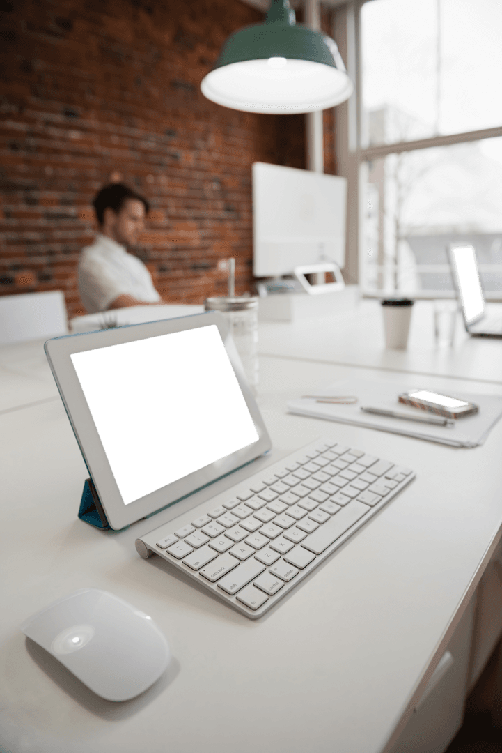 Transparent Tablet and Keyboard on Modern Office Desk