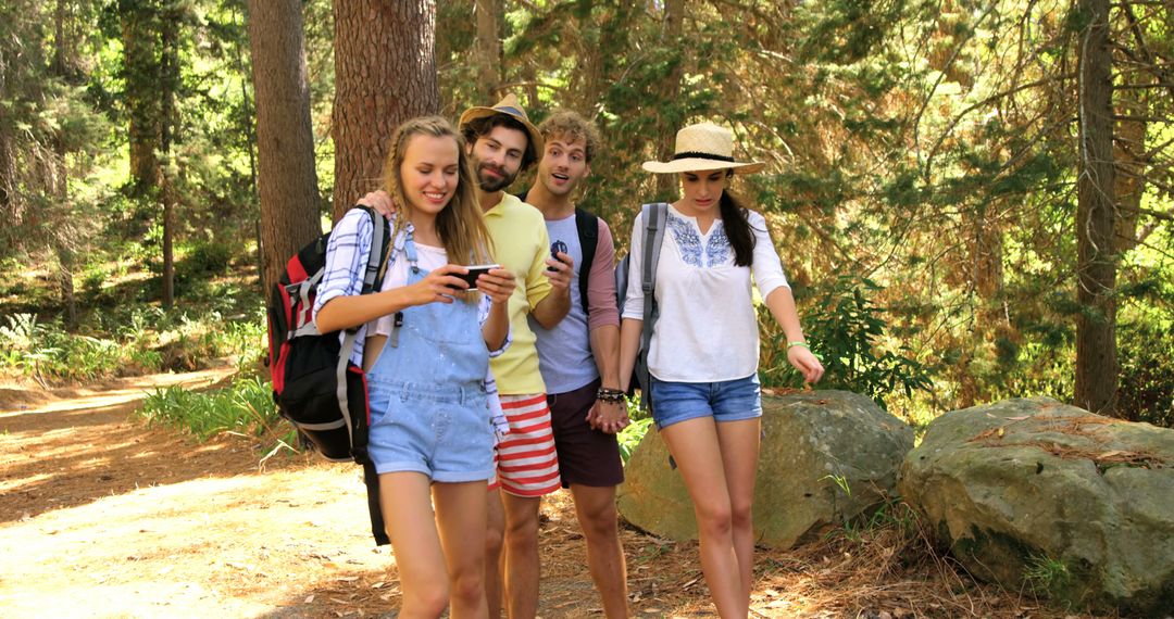 Group of Friends Hiking in Forest with Mobile Phones - Free Images, Stock Photos and Pictures on Pikwizard.com