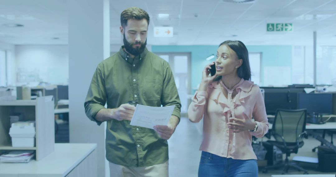 Walking Colleagues Engaging in Mobile and Documented Discussion in Office