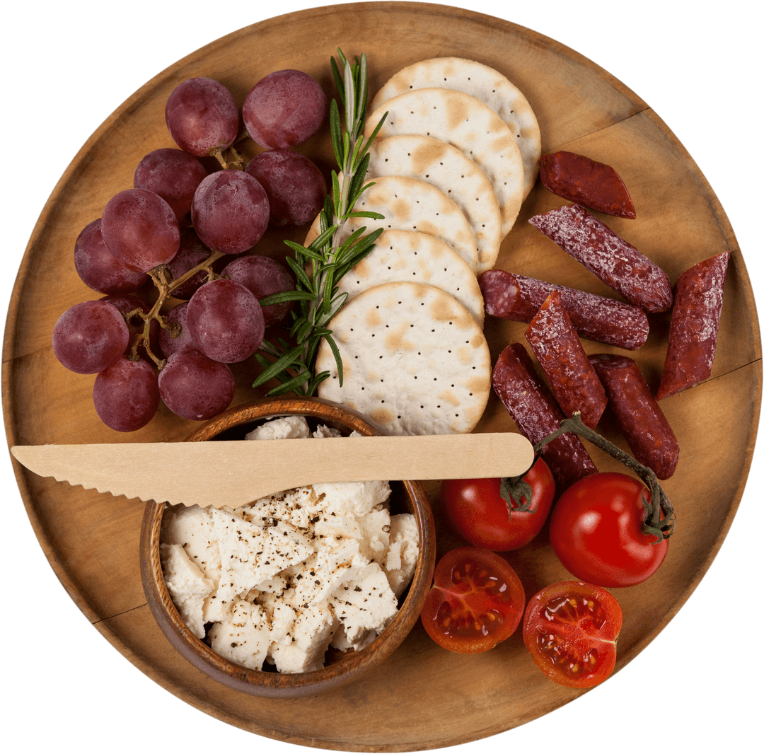 Gourmet Cheese and Meat Platter with Grapes on Transparent Board