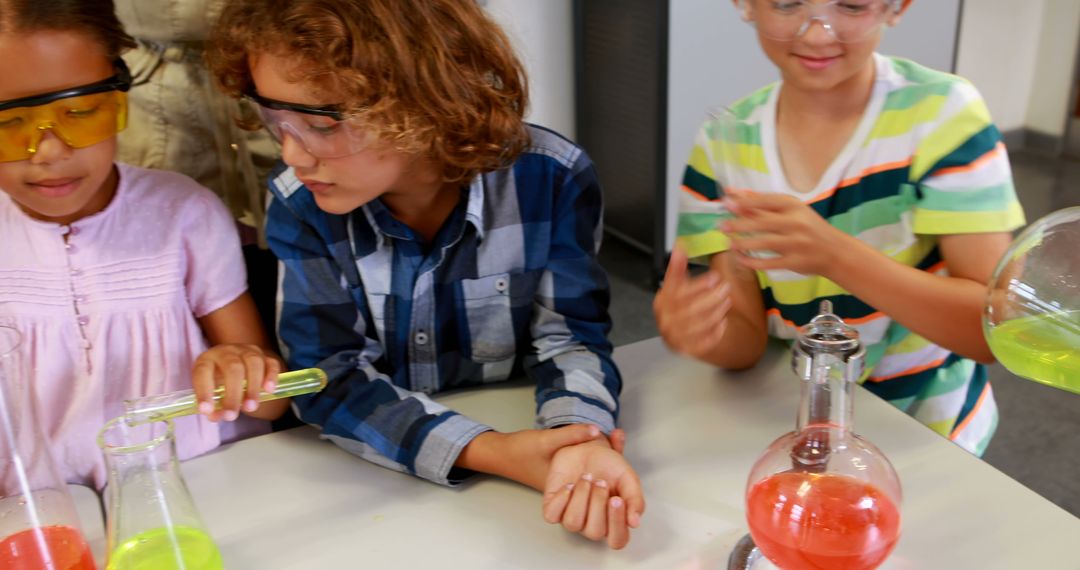 Young Children Conducting Science Experiment in Classroom - Free Images, Stock Photos and Pictures on Pikwizard.com