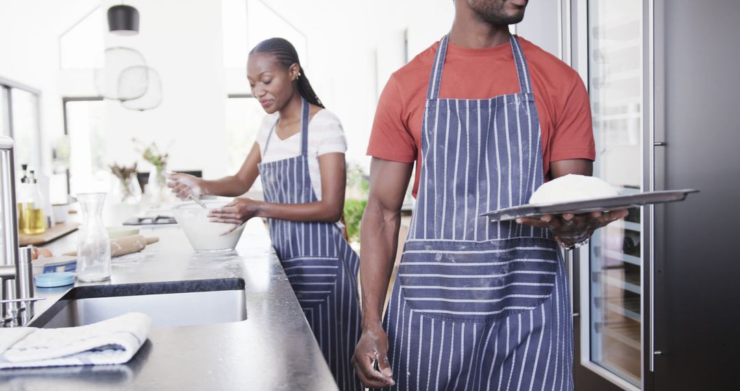 African American Couple Baking Together in Modern Kitchen - Free Images, Stock Photos and Pictures on Pikwizard.com