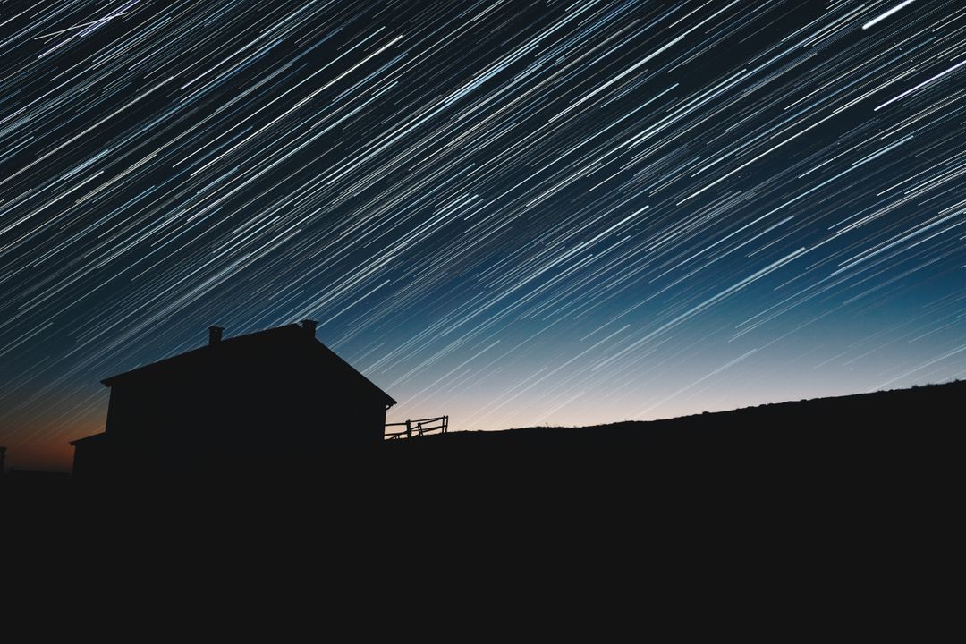 Night Sky Star Trails Over Rural House Silhouette - Free Images, Stock Photos and Pictures on Pikwizard.com