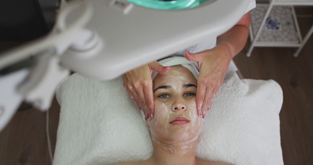 Caucasian Woman Enjoying Facial Treatment at Beauty Salon - Free Images, Stock Photos and Pictures on Pikwizard.com