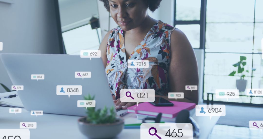 African American Woman Engaging with Social Media Metrics on Laptop
