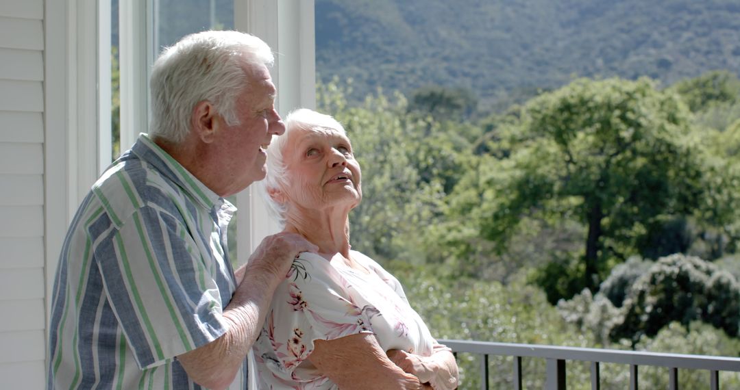 Elderly Couple Enjoying Relaxing Time on Balcony with Scenic View - Free Images, Stock Photos and Pictures on Pikwizard.com