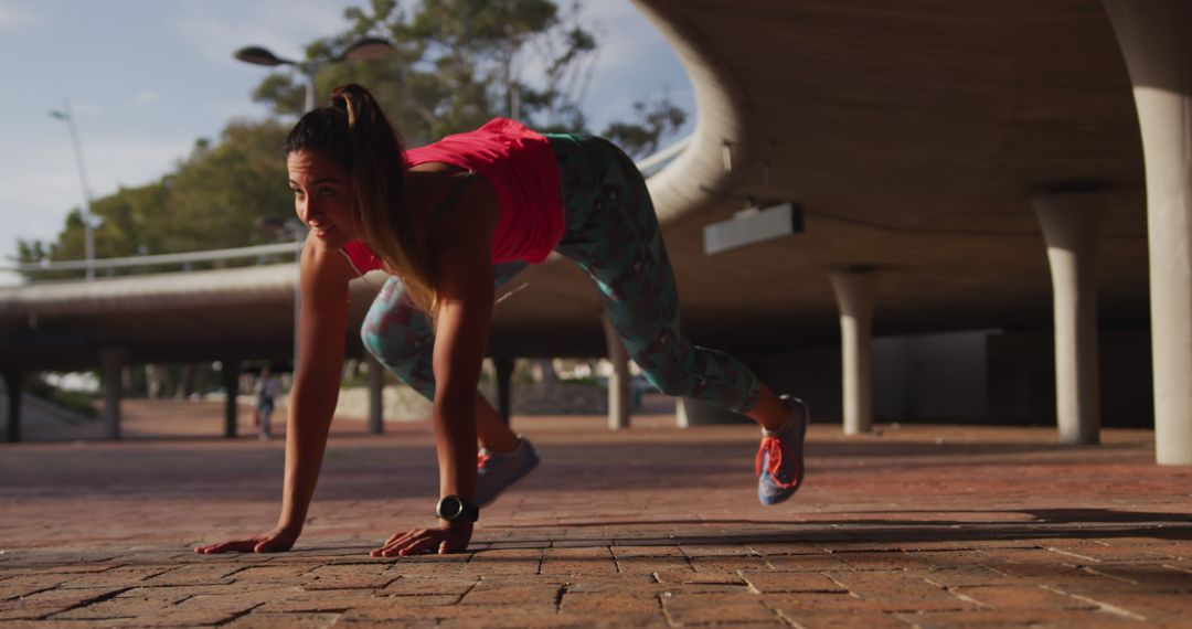 Woman Doing Outdoor Mountain Climbers under Bridge - Free Images, Stock Photos and Pictures on Pikwizard.com