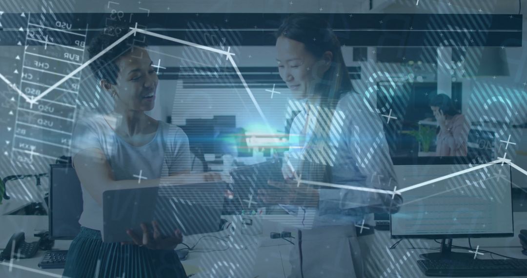 Business Women Collaborating with Digital Data Overlay in Modern Office