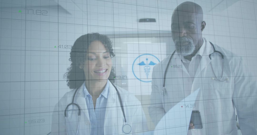 Doctors Collaborating While Analyzing Digital Data in Hospital