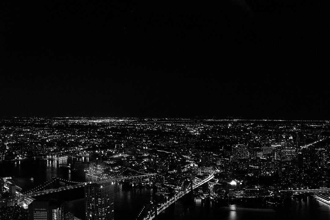 Black and White Aerial View of City Lights and Skyscrapers at Night - Free Images, Stock Photos and Pictures on Pikwizard.com