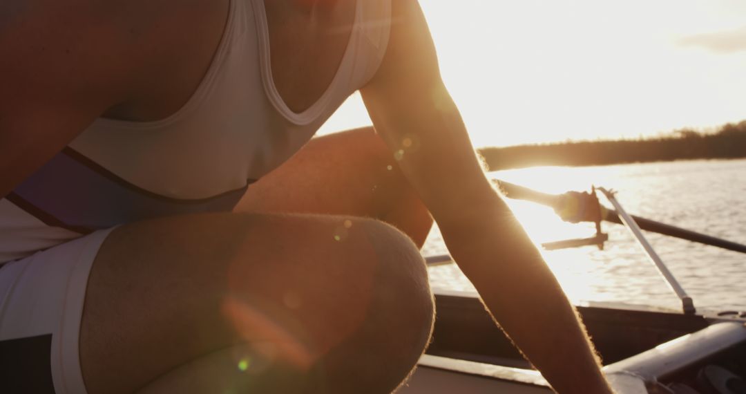 Athlete Preparing for Rowing Session at Sunset - Free Images, Stock Photos and Pictures on Pikwizard.com