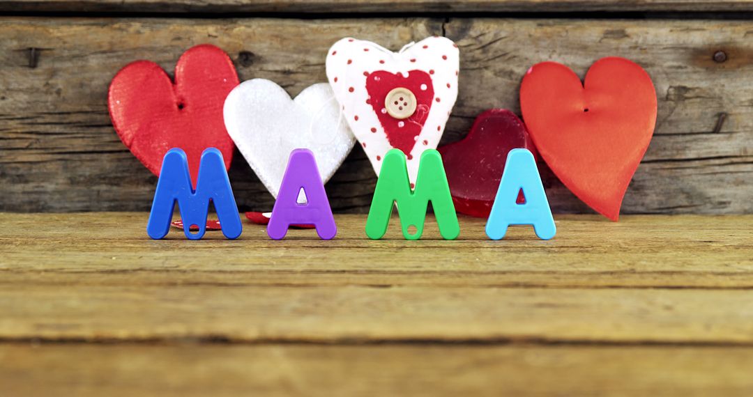 Mama Letters with Hearts on Wooden Background - Free Images, Stock Photos and Pictures on Pikwizard.com