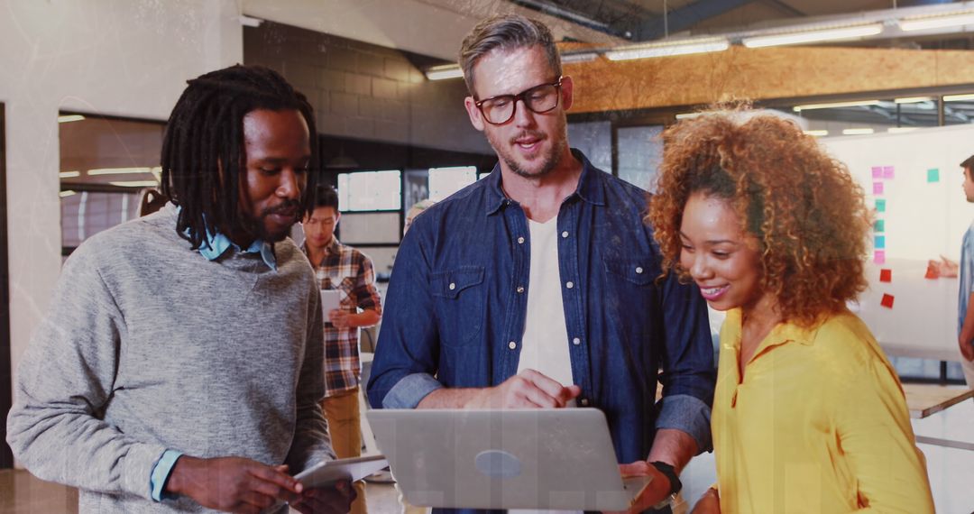 Diverse Students and Teacher Collaborating at School