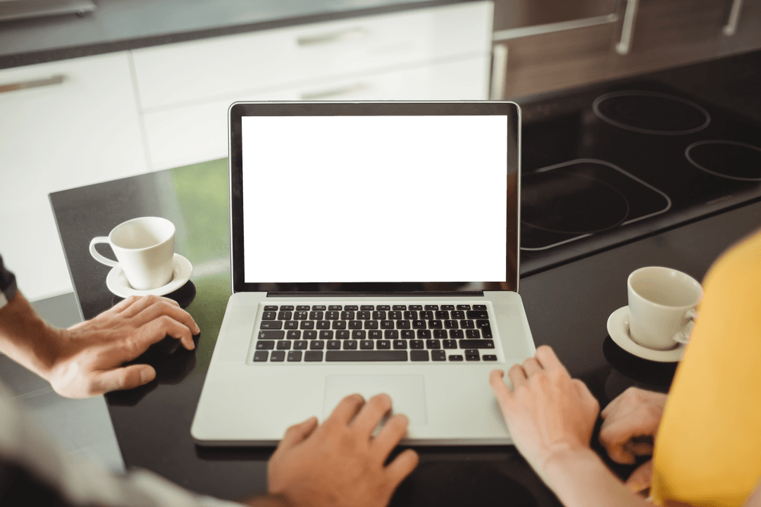 Couple Discussing Kitchen Remodel with Transparent Laptop Screen