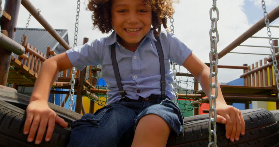 Happy Biracial Boy Climbing on Fun Play Structure