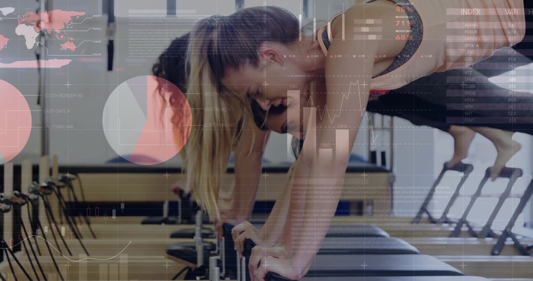 Women Exercising on Reformers in Modern Studio with Data Overlay