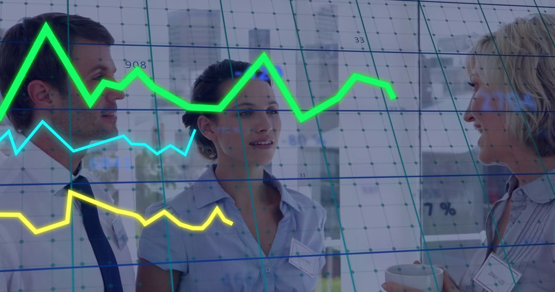 Colleagues Analyzing Data with Overlaid Graphs in Modern Office