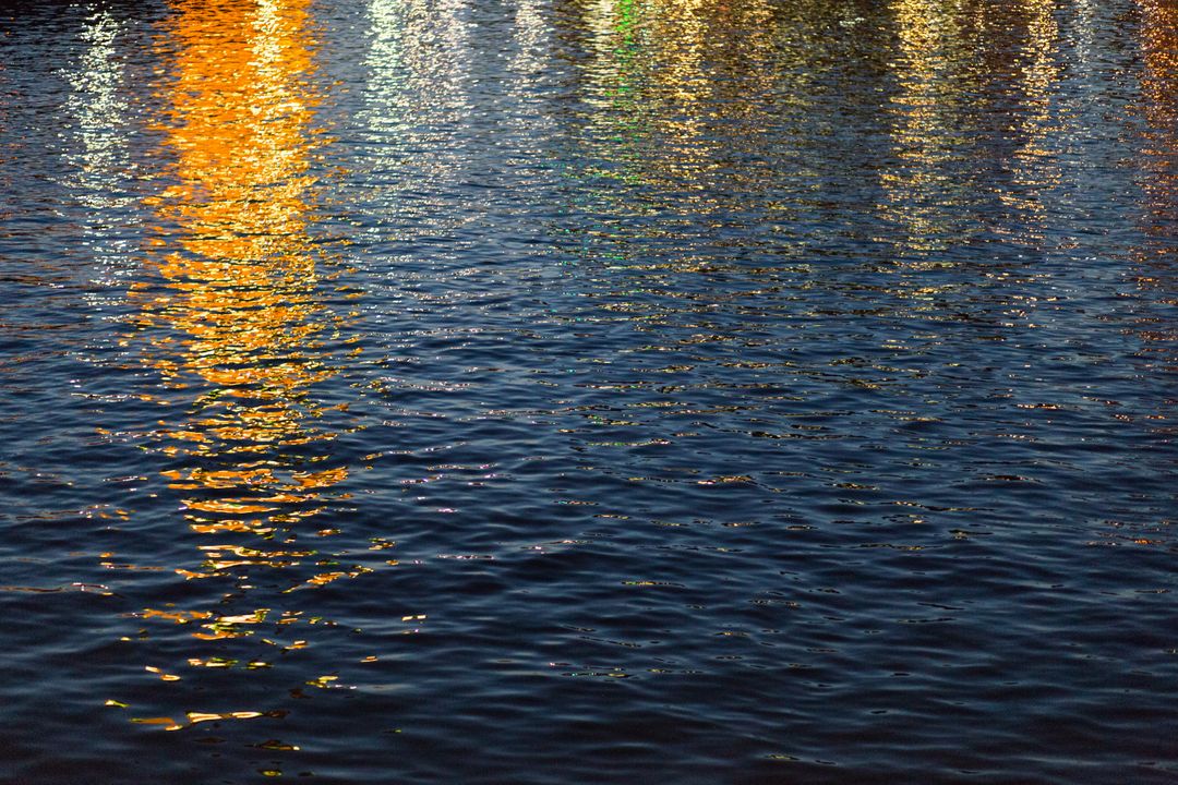 Sunset water reflections golden - Free Images, Stock Photos and Pictures on Pikwizard.com
