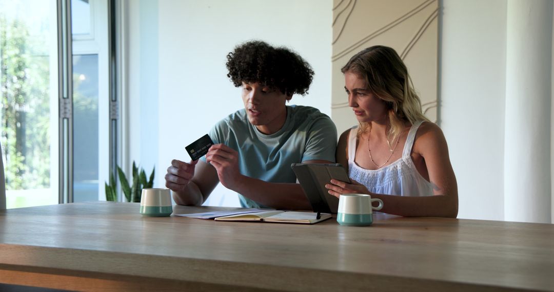Couple Discussing Financial Documents at Home