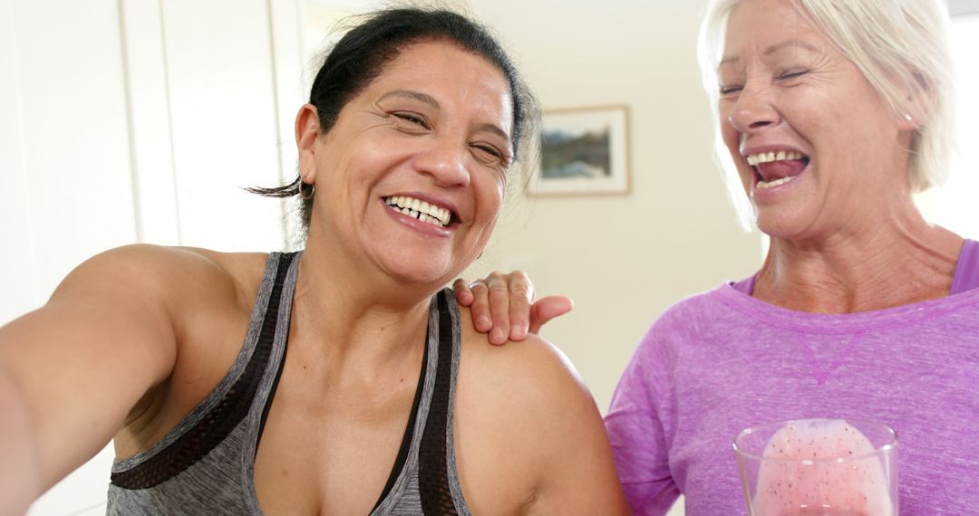 Smiling Senior Women Enjoying Relaxed Time Together at Home - Free Images, Stock Photos and Pictures on Pikwizard.com