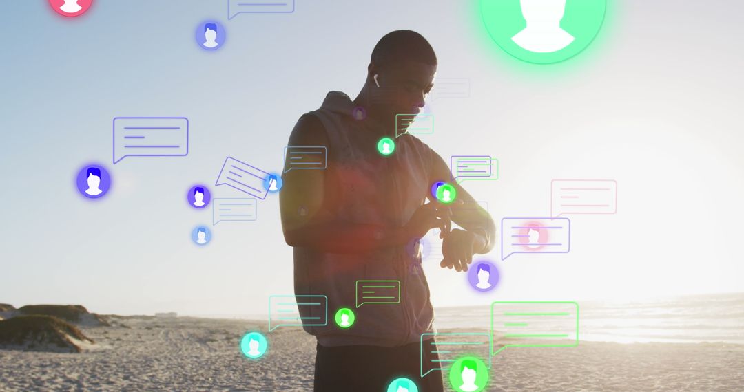 Man on Beach Engaging with Smartwatch and Digital Messages