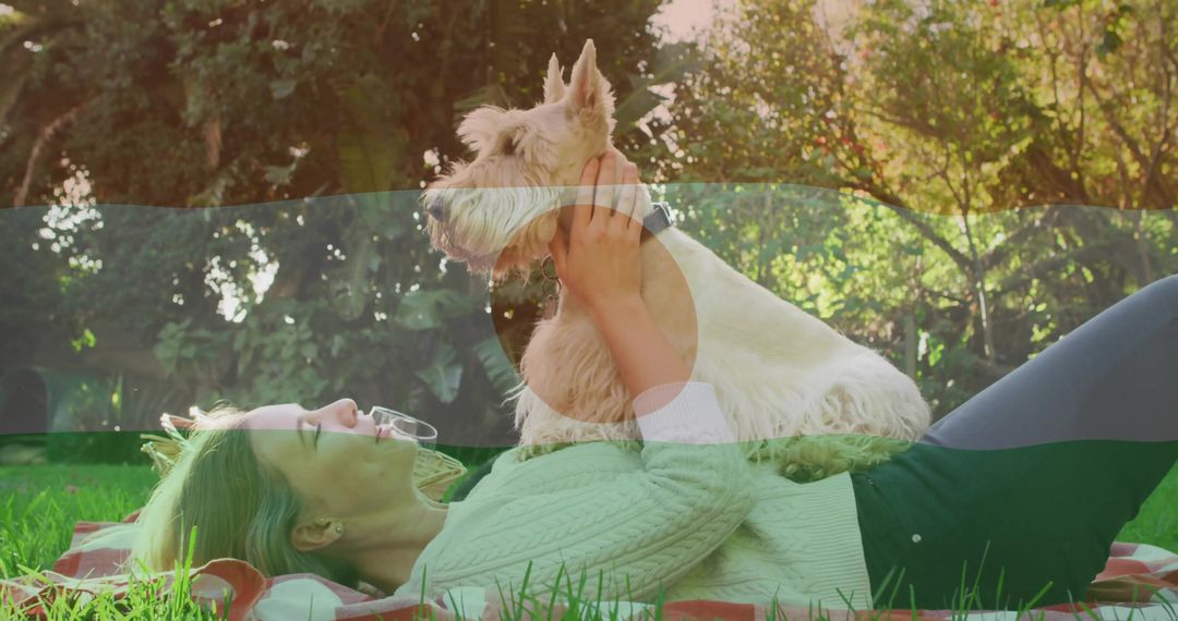 Woman Relaxing with Terrier on Picnic Blanket