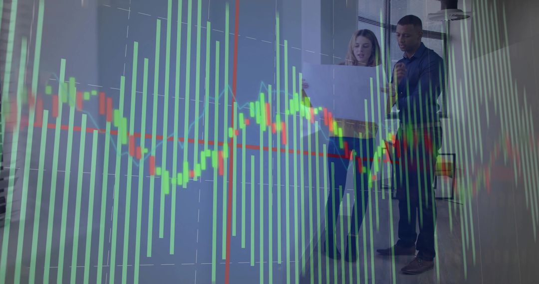 Coworkers Analyzing Stock Data in Modern Office