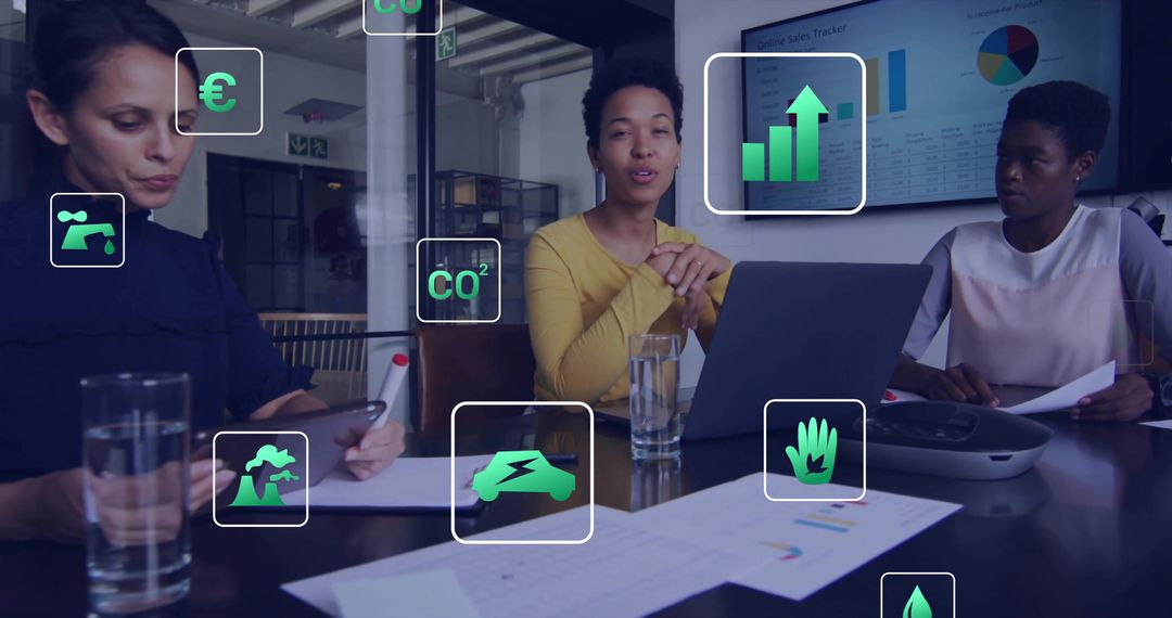 Team Collaborating on Innovative Sustainability Strategy Using Technology