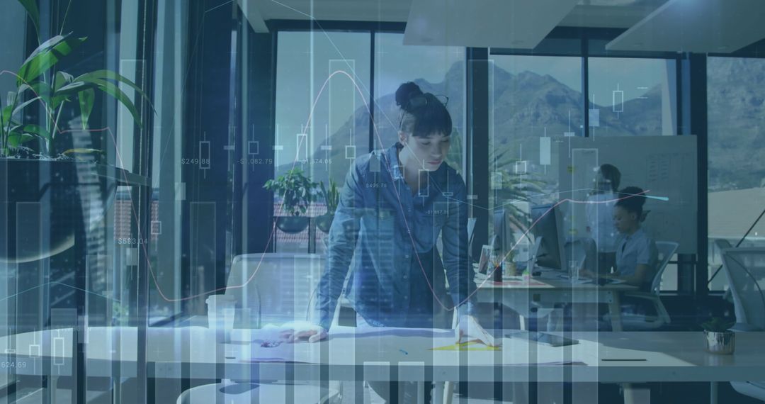 Focused Project Manager Analyzing Workplace Data