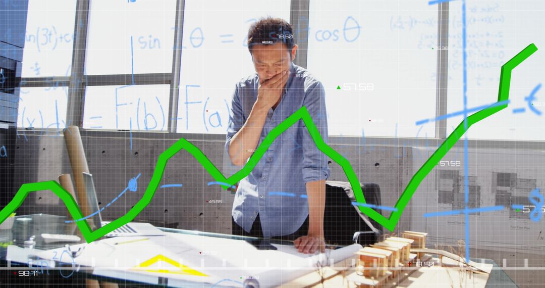 Asian Professional Analyzing Data for Business Growth