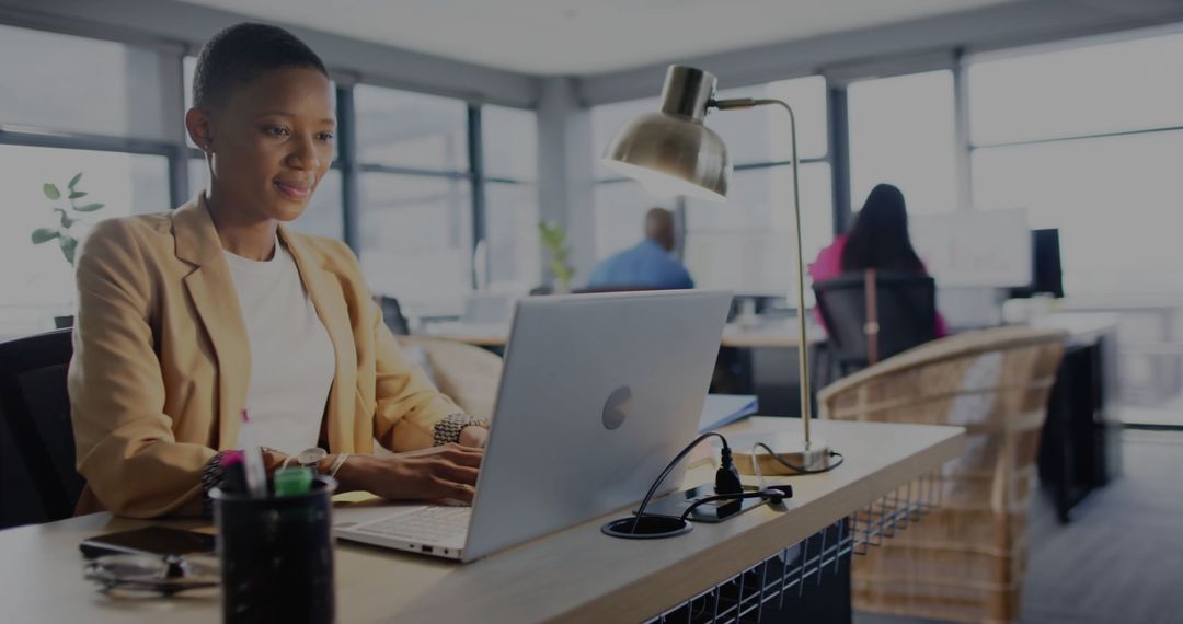 Focused Professional Analyzing Financial Data in Modern Office