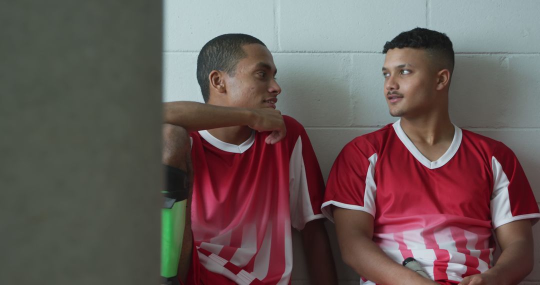 Diverse Hockey Players Relaxing in Locker Room Setting