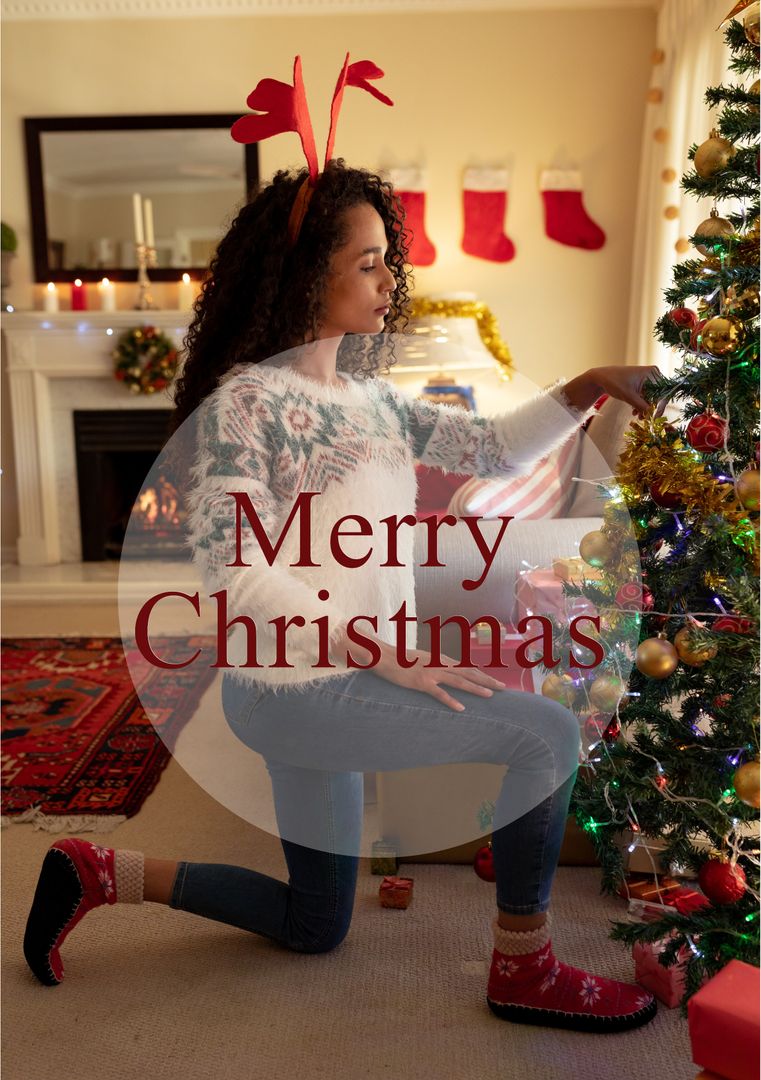 Woman Decorating Christmas Tree with Reindeer Antlers and Festive Spirit - Download Free Stock Templates Pikwizard.com