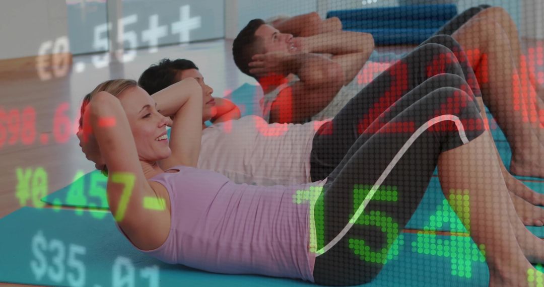 Group Doing Core Crunches on Mats with Stock Market Ticker Overlay for Wellness