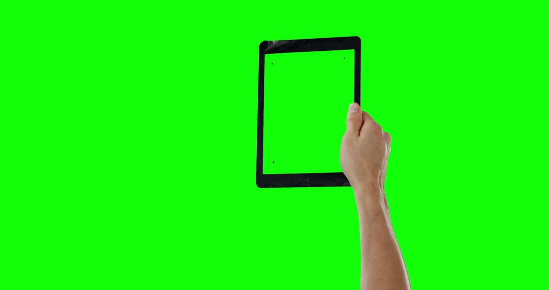 Hand Holding Tablet With Green Screen for Inserting Custom Content - Free Images, Stock Photos and Pictures on Pikwizard.com