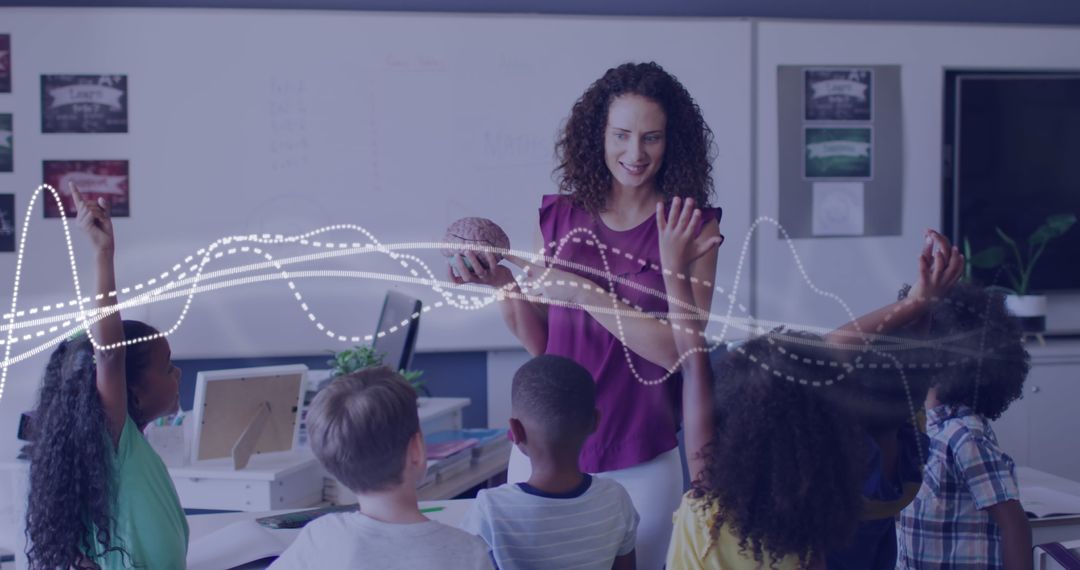 Engaged Teacher Demonstrating Brain Model to Curious Students