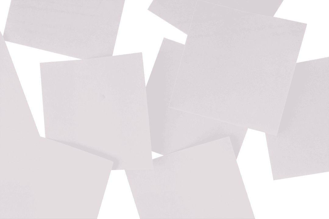 Blank Transparent White Paper Sheets Scattered on Surface