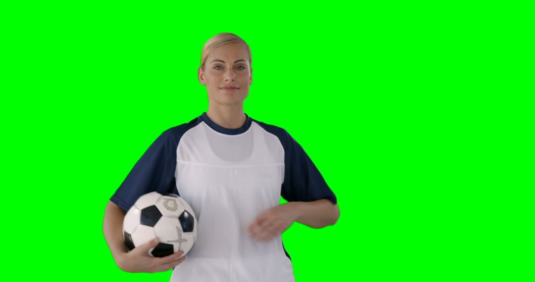 Confident Female Soccer Player Holding Ball Against Green Screen with Copy Space - Free Images, Stock Photos and Pictures on Pikwizard.com