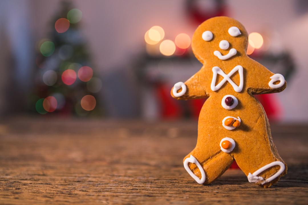 Festive Gingerbread Man on Wooden Table - Free Images, Stock Photos and Pictures on Pikwizard.com