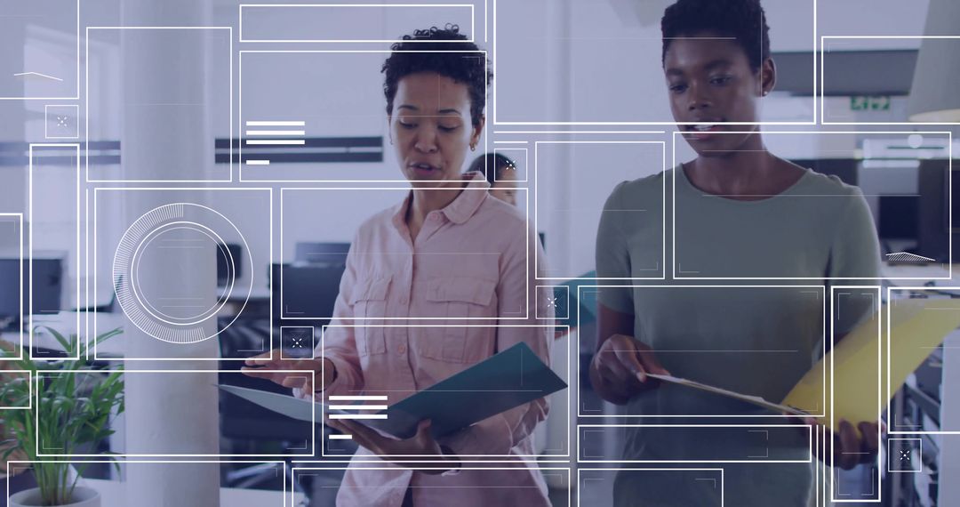 Reviewing Documents Together in Modern Open-Plan Office Collaborating Over Project Files