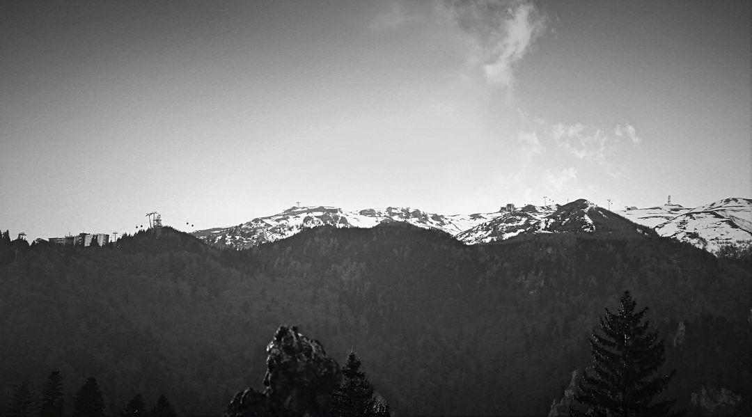 Misty Mountain Range with Snow-Capped Peaks in Black and White - Free Images, Stock Photos and Pictures on Pikwizard.com