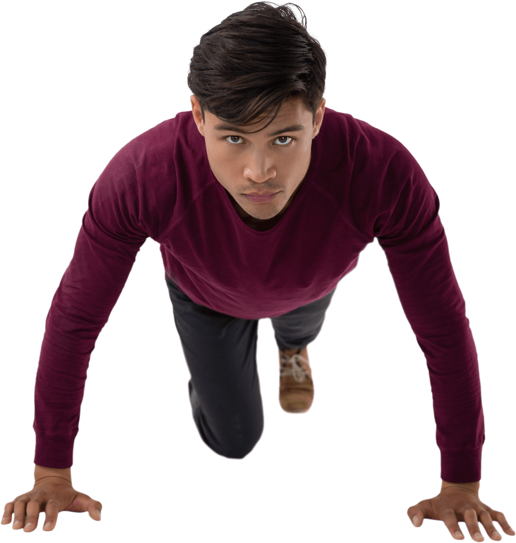 Transparent Man Kneeling with Focused Expression and Burgundy Sweater