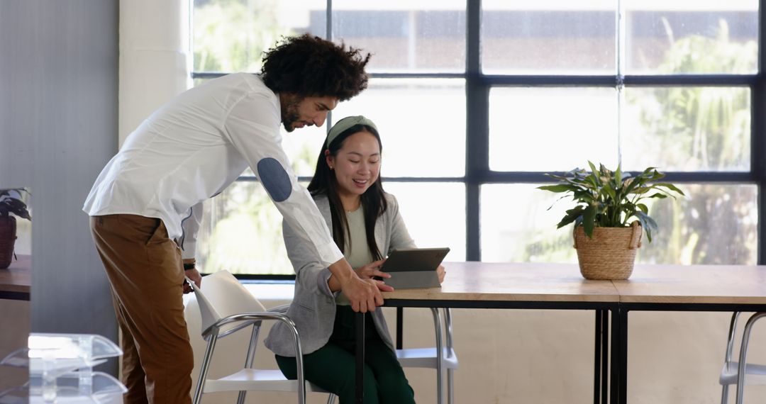 Collaborative Business Meeting with Digital Tablet in Office