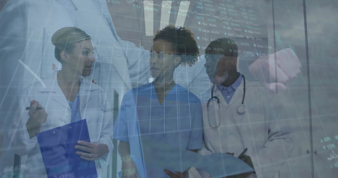 Healthcare Team Collaborating on Digital Diagnostic Charts in Hospital Corridor