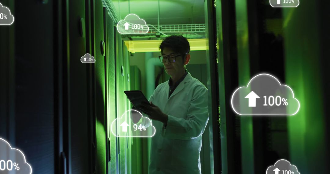 Asian Male Engineer in Server Room with Cloud Data