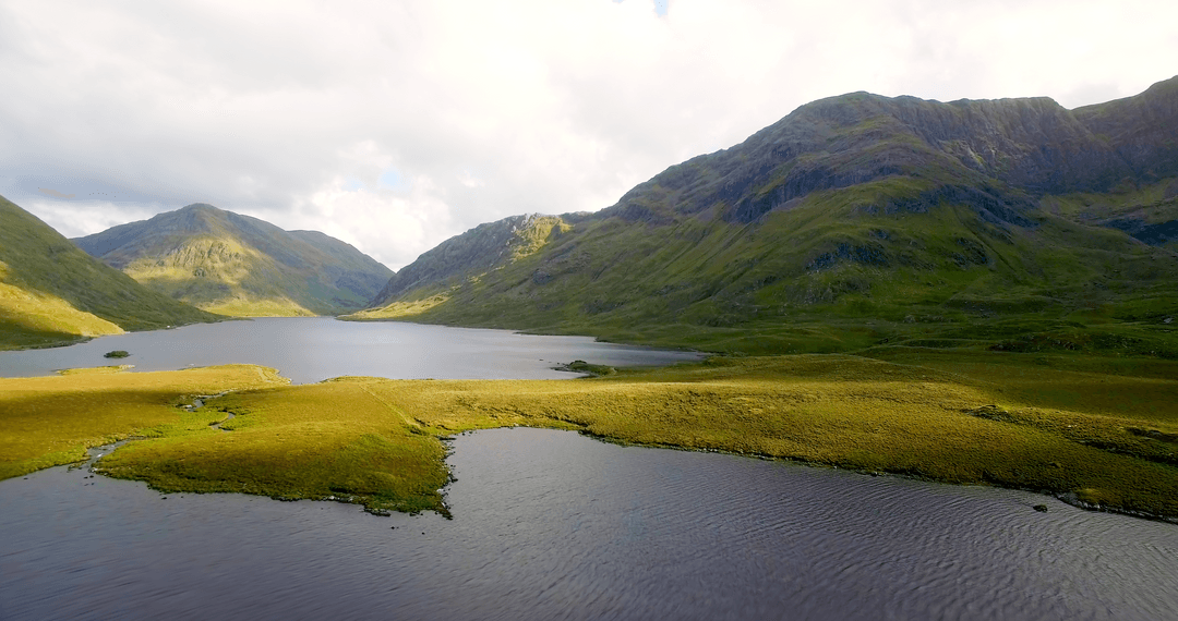 Transparent Mountain Lake Scene with Clear Sky Reflection